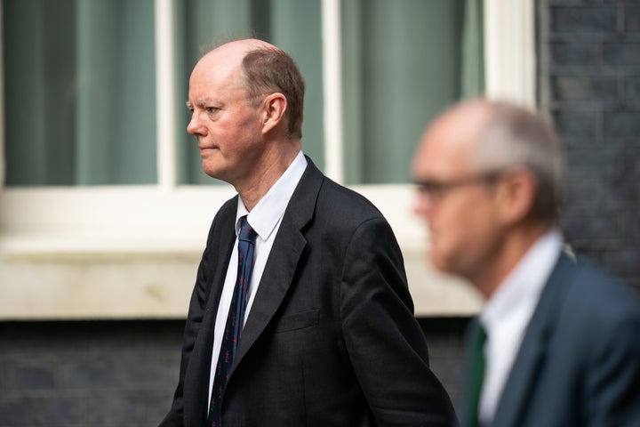 Chief Medical Officer Professor Chris Whitty (left) and Chief Scientific Adviser Sir Patrick Vallance arrive at Downing Street. 