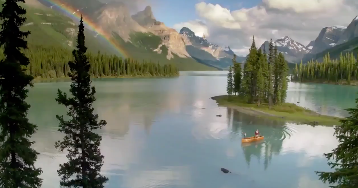 A screencap from a video promoting Edmonton as an NHL hub city showing a stunning image of the Rocky Mountains, which are definitely not where Edmonton is.