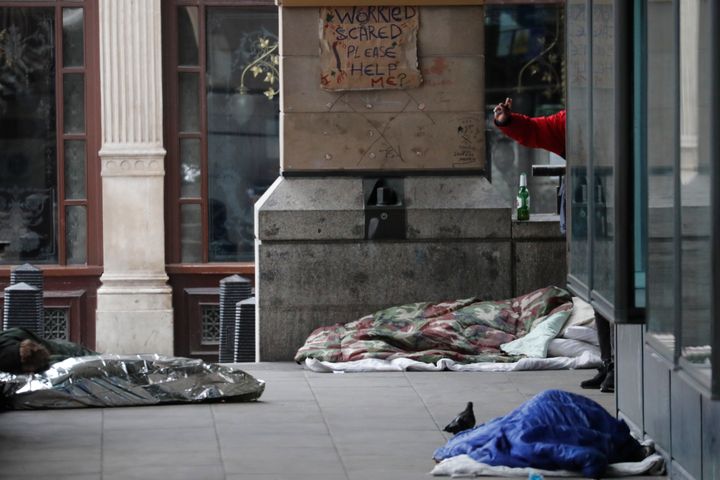 Homeless people sleeping rough on the pavement near the Houses of Parliament in March.