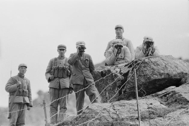 Chinese soldiers at the border on the Nathu La mountain pass on 3 October