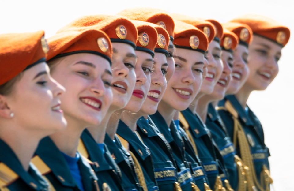 Female Ministry of Emergency Situations employees march during the Victory Day military parade marking...