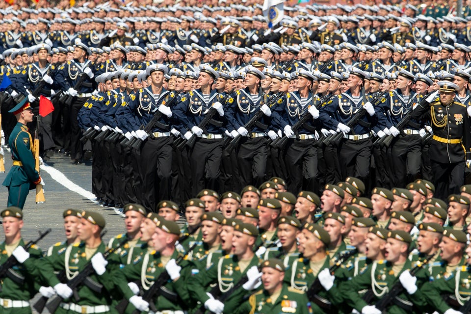 Russian sailors, center, march in Red Square during the Victory Day military parade marking the 75th...