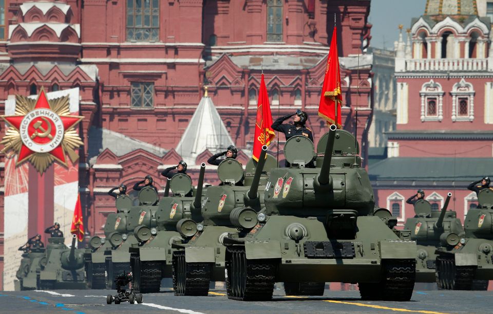 Soviet tanks T-34 roll toward Red Square during the Victory Day military parade marking the 75th anniversary...