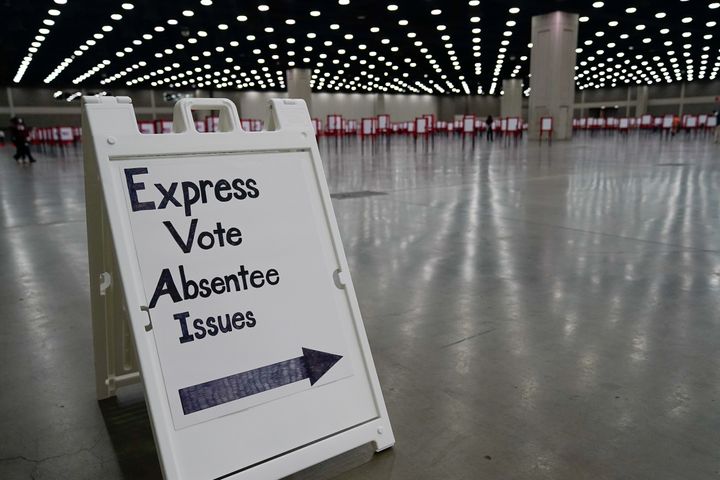 A sign directs voters on primary election day in Louisville, Kentucky, Tuesday.