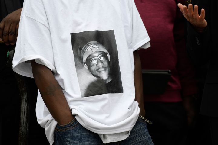LaWayne Mosley, father of Elijah McClain, wears a T-shirt with is son's picture on it during a press conference in front of t