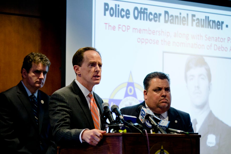 Sen. Pat Toomey (R-Pa.), center, and Rep. Mike Fitzpatrick (R-Pa.), left, were joined by the Fraternal Order of Police's 