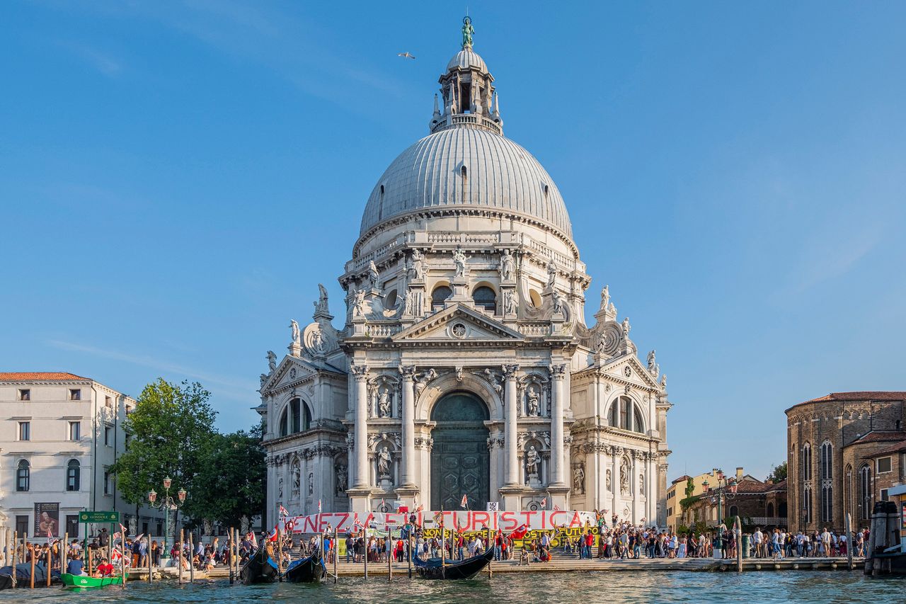 Demonstrators in Venice protest against overtourism and cruise ships on June 13.