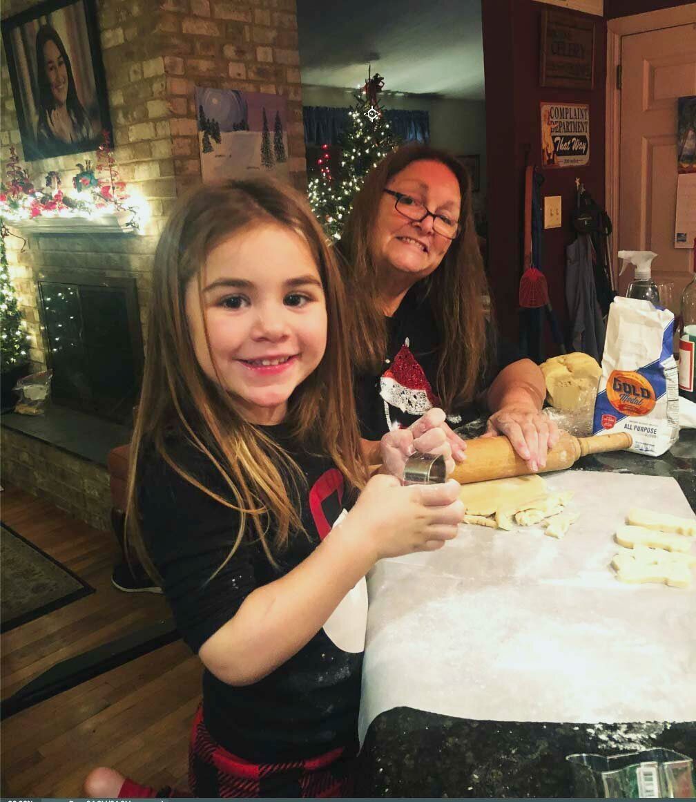 Joanne H. Clough and her granddaughter, Carter, make Christmas cookies in December 2019.