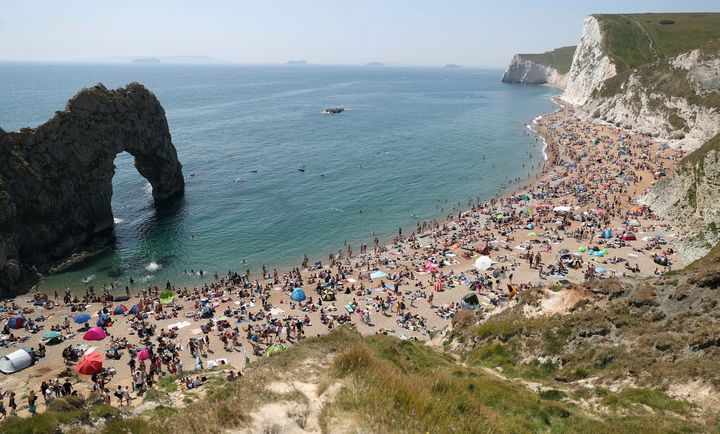 People on the beach at Durdle Door on Saturday, May 30. 