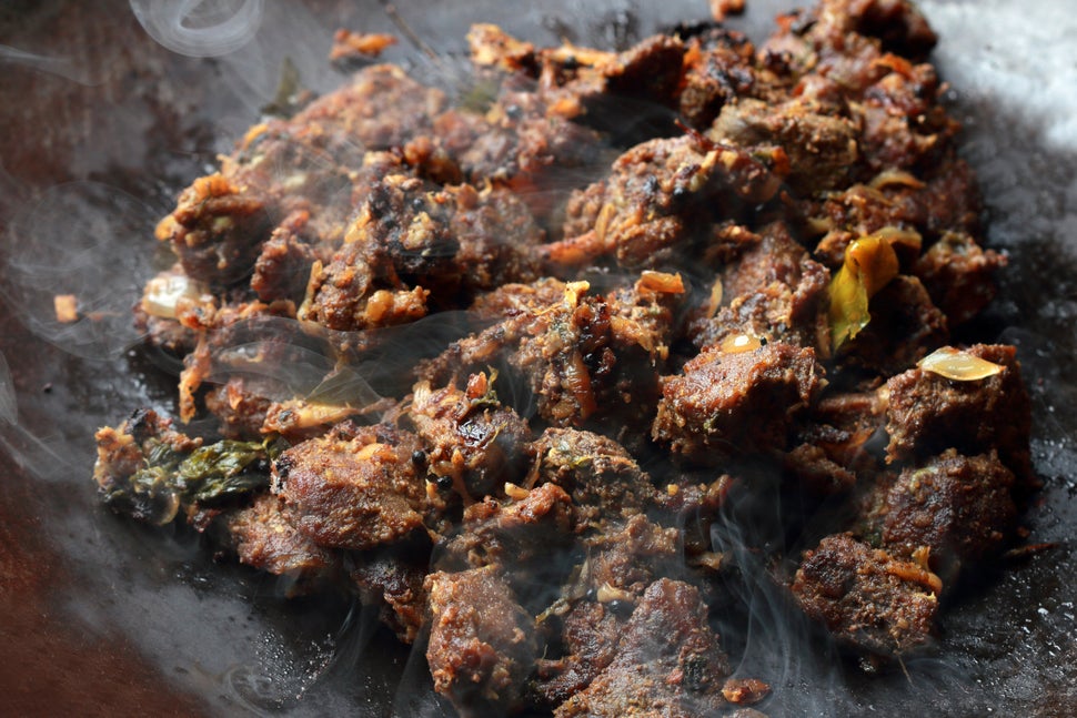 Steaming buff fry on a frying pan