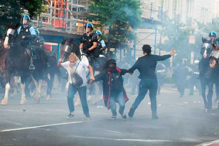 Protesters are tear-gassed as the police disperse them near the White House on June 1, 2020.
