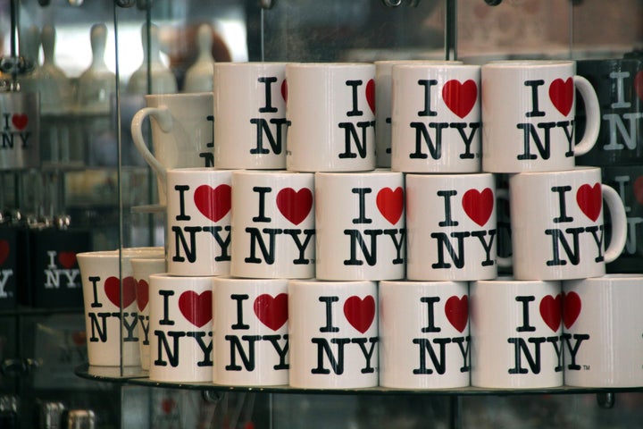 Mugs with the "I ❤️ NY" logo on sale at a souvenir shop. 