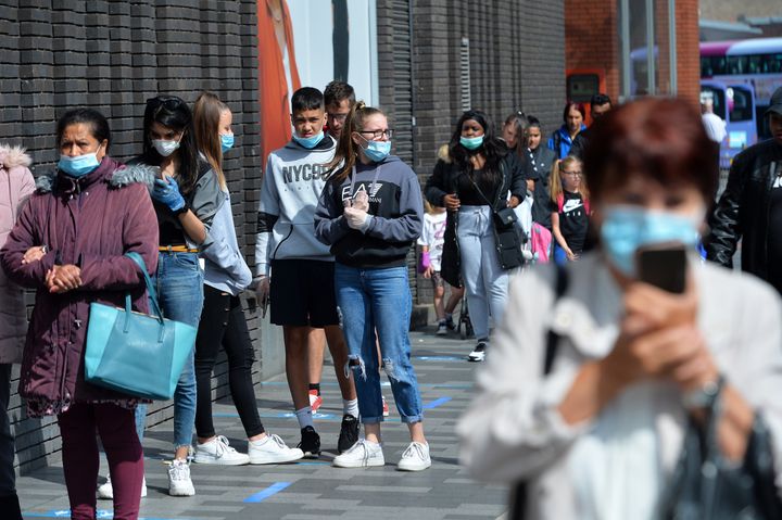 Shoppers queue outside Primark in Leicester on June 15, the first day of opening since the national lockdown was imposed in March