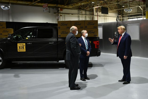 President Donald Trump — seen during a visit to a Ford Motor Co. plant in Michigan in May...