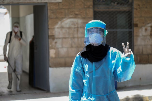 A health worker in Taez, Yemen, on June 21,