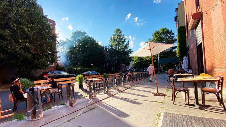 Patrons and business owners are figuring out how to safely navigate outdoor dining as cities ease their lockdown restrictions. 