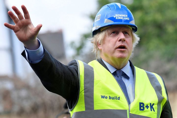 Boris Johnson visits the construction site of Ealing Fields High School in west London.
