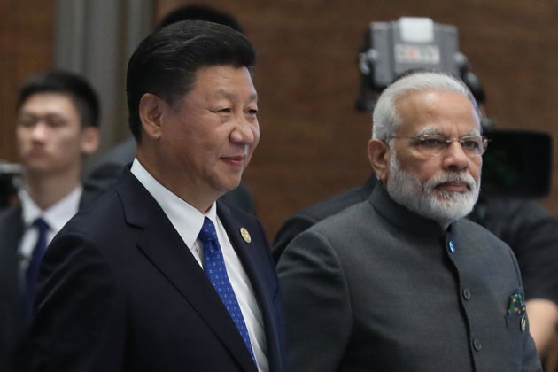File photo of Chinese President Xi Jinping and Prime Minister Narendra