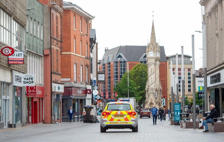 A police car on Gallowtree Gate in Leicester after the Health Secretary Matt Hancock imposed a local lockdown following a spike in coronavirus cases in the city.