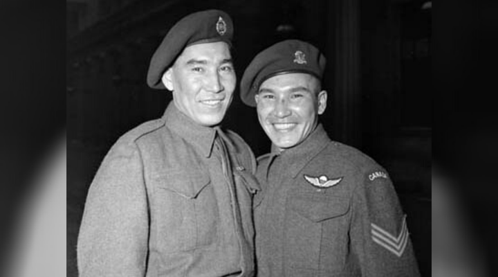 Tommy Prince, right, with a brother at Buckingham Palace in London, where he was awarded two gallantry medals in 1945.