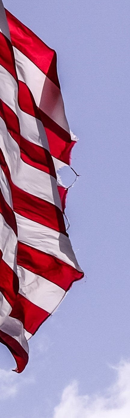 The flag flying at Mar-a-Lago on March 9 was torn and frayed. Under the U.S. flag code, damaged flags should be destroyed in