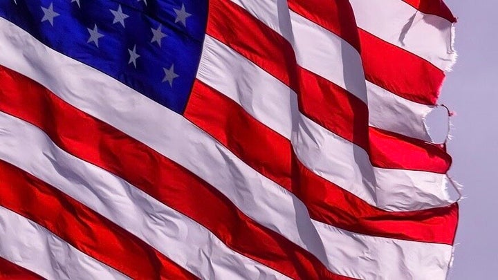 The flag flying at Mar-a-Lago on March 9 was torn and frayed. Under the U.S. flag code, damaged flags should be destroyed in