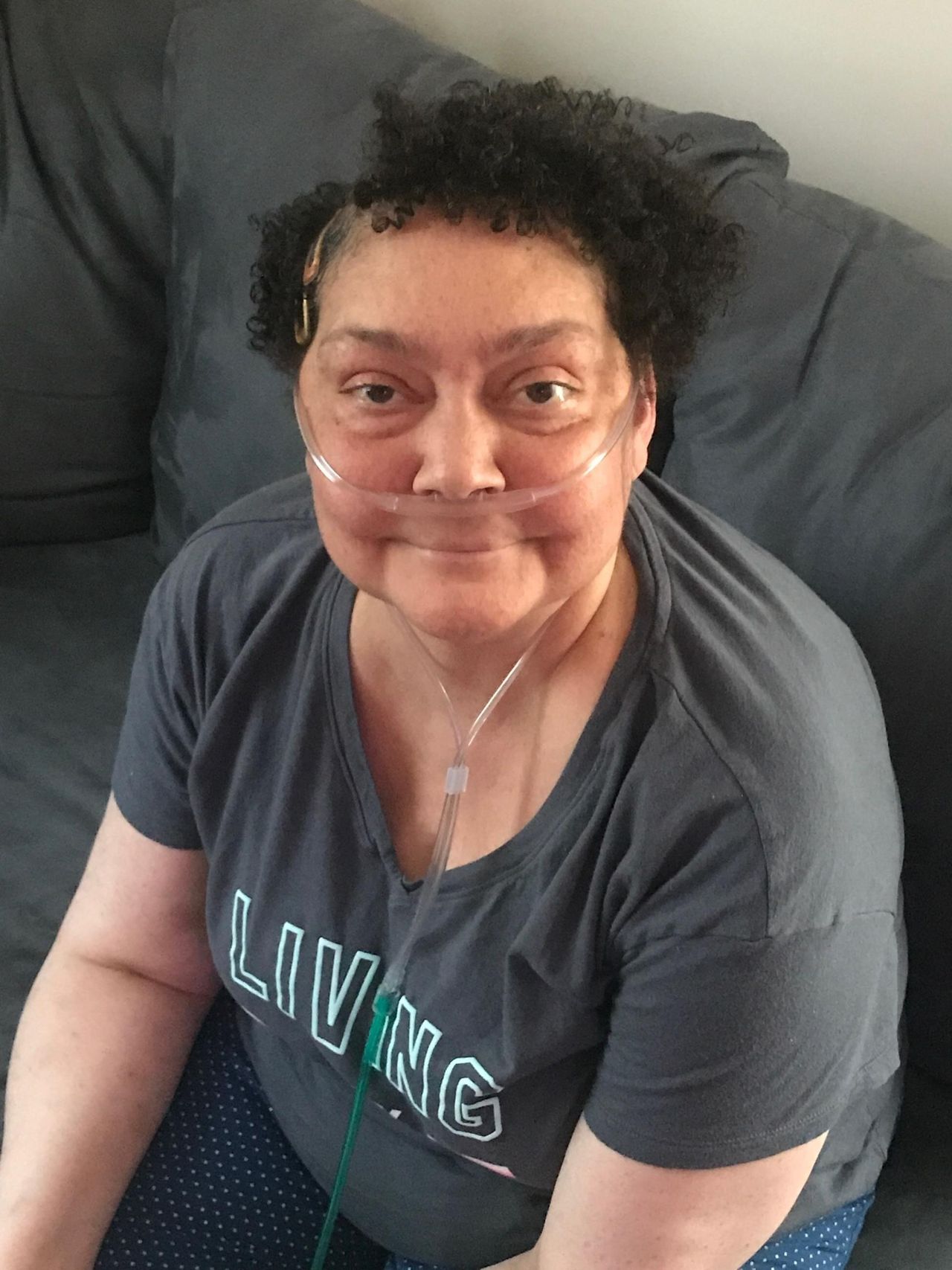 Arielle Reavis’s mother, Dina Bailey, in late June. Bailey was hospitalized with coronavirus in May, but tested negative in June.