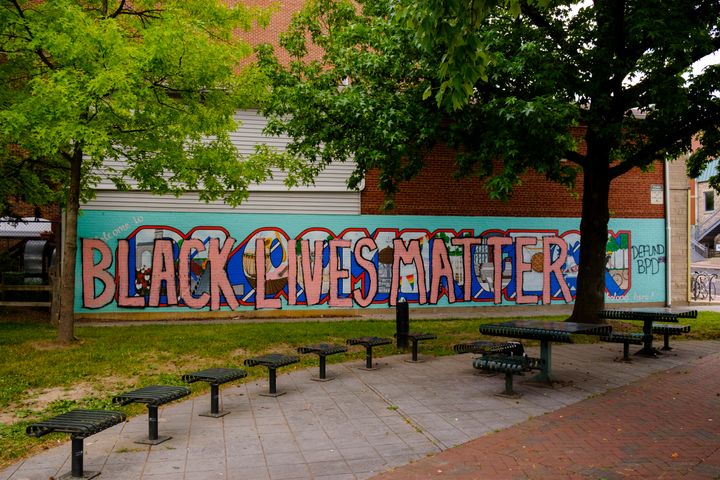 The words "Black Lives Matter" are painted over a mural in Bloomington, Indiana, on June 19. Bloomington is about 70 miles southwest of Carmel.