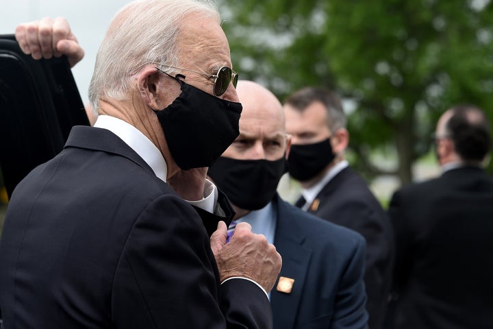 Joe Biden wore a black face mask while paying respects to fallen service members on Memorial Day in New Castle, Delaware, on May 25.