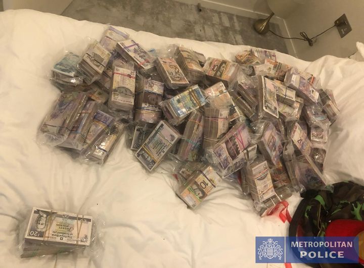 Undated handout photo issued by the Metropolitan Police of a quantity of cash seized by officers in Operation Venetic.