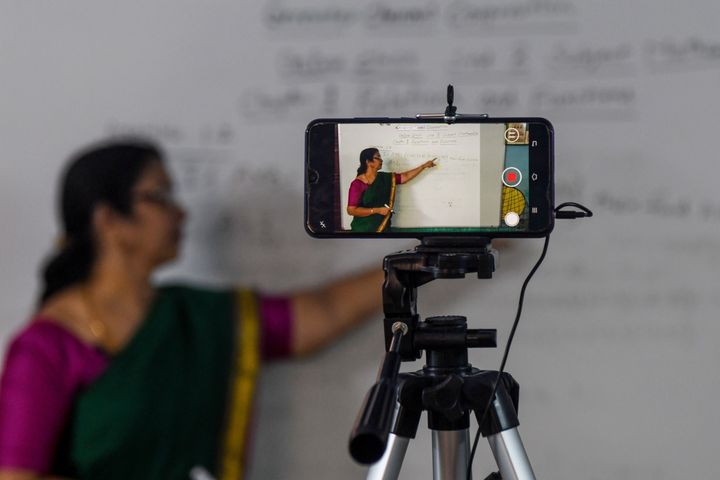 A school teacher gives an online class at a government school in Chennai on June 3, 2020.