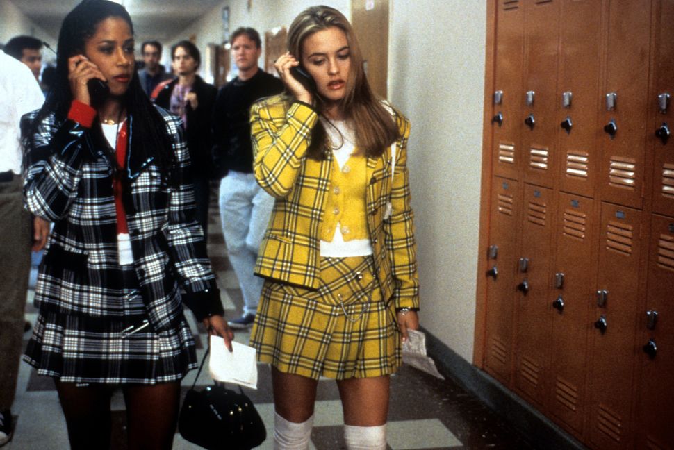 The iconic costumes for Stacey Dash (left) and Alicia Silverstone in "Clueless" were designed by Mona May, whose other credit