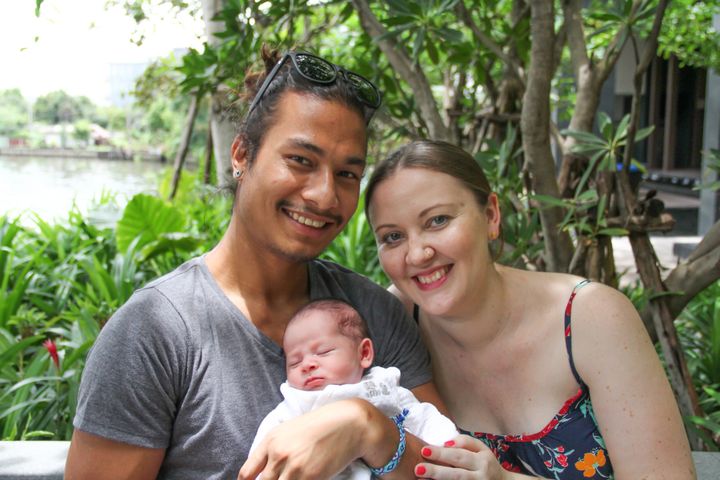 The three of us at our temporary home in Bangkok just a few days after my daughter's birth.
