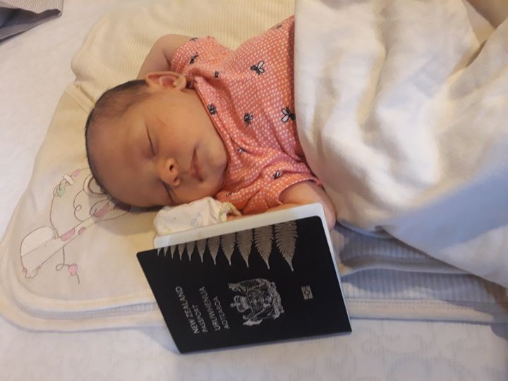 My daughter wasn't as excited as I was to receive her New Zealand passport by mail while living in Thailand. 