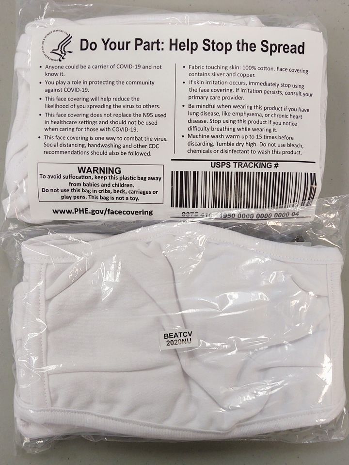 Cloth masks supplied to nursing homes by FEMA are not authorized for use in a health care setting, according to their label.