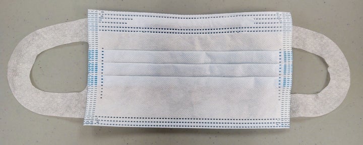 This disposable face covering is one of the items that Williams said his facilities were provided by FEMA. The ear loops are