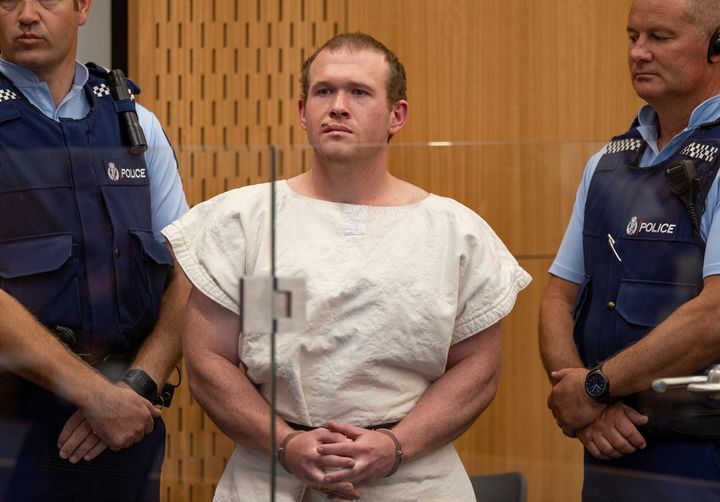 FILE PHOTO: Brenton Tarrant, charged for murder in relation to the mosque attacks, is seen in the dock during his appearance in the Christchurch District Court, New Zealand March 16, 2019. Mark Mitchell/New Zealand Herald/Pool via REUTERS/File Photo