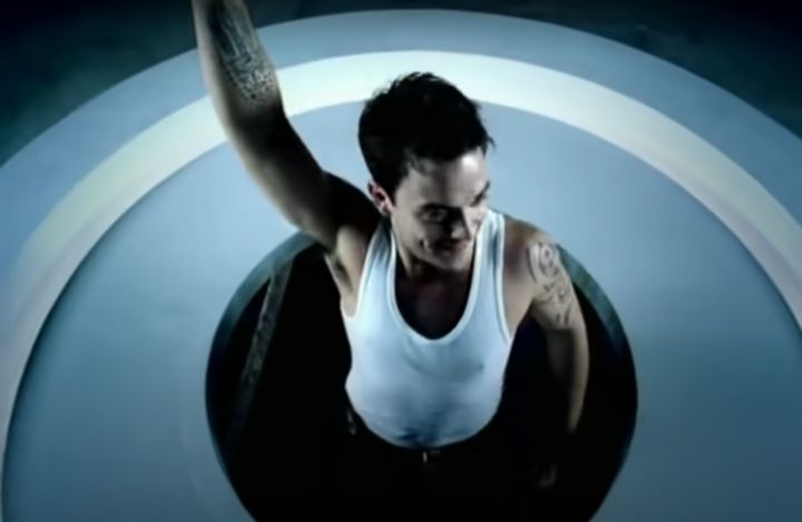 Robbie makes a dramatic entrance in the Rock DJ video, before things take a turn