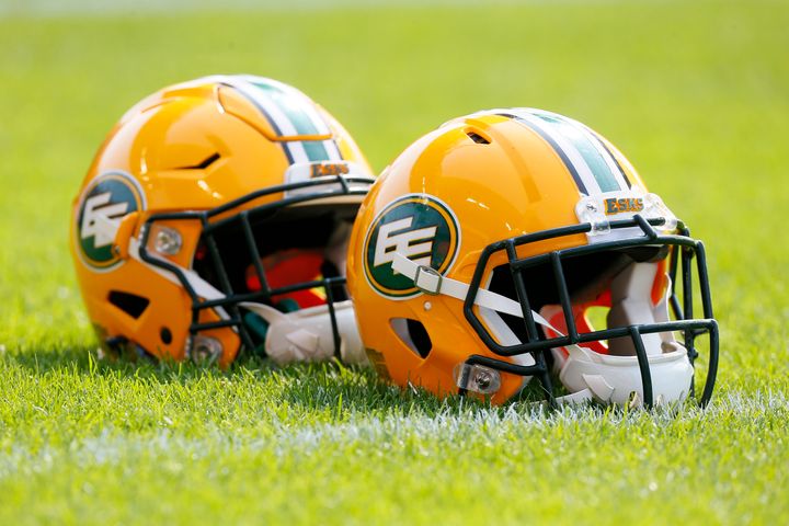 Edmonton Eskimos helmets lined up during a warm-up against the Toronto Argonauts at BMO field in Toronto on Sept. 16, 2017.