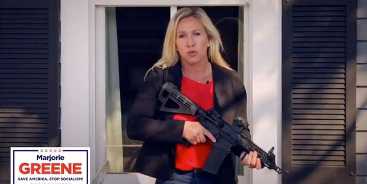 Republican Congressional candidate and QAnon conspiracy cultist Marjorie Taylor Greene brandishes an AR-15 assault rifle while defending property against antifa activists who never appeared.