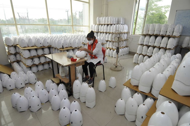 Workers of AVGA healthcare make portable ventilators at Sector 7 during the lockdown to curb the spread...