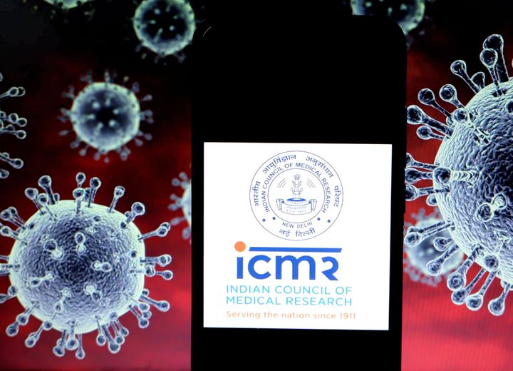 INDIA - 2020/07/04: In this Photo illustration a logo of ICMR - Indian Council of Medical Research seen displayed on a smartphone with a COVID-19 coronavirus image in the background. (Photo Illustration by Avishek Das/SOPA Images/LightRocket via Getty Images)