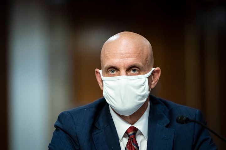 Dr. Stephen Hahn wears a face mask during a Senate hearing in Washington on June 30.