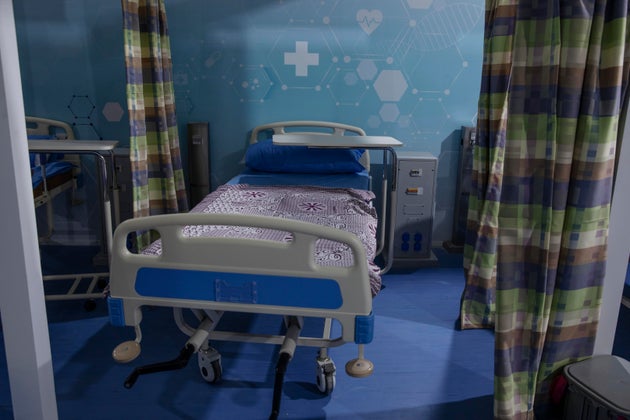 Hospital beds are prepared to receive COVID-19 patients at Ain Shams University Field Hospital in Cairo,...
