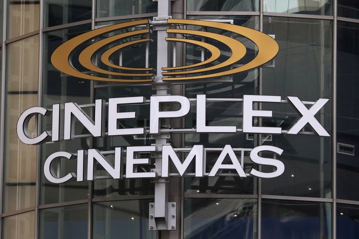 A Cineplex movie theatre sign looms over Yonge Street in Toronto on March 16, 2020. Analysts say they expect Cineworld to buy Cineplex on "revised terms" after the former backed out of a takeover deal.