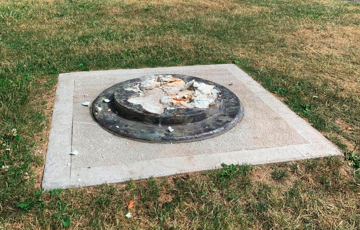 The remnants of a Frederick Douglass statue that was ripped from its base at a park in Rochester, New York.