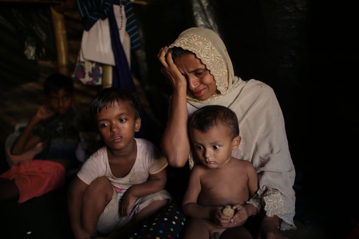 Jamila Begum, 35, cries when talking about how members of Myanmar's armed forces killed her son and husband during an interview with The Associated Press in Kutupalong refugee camp in Bangladesh.