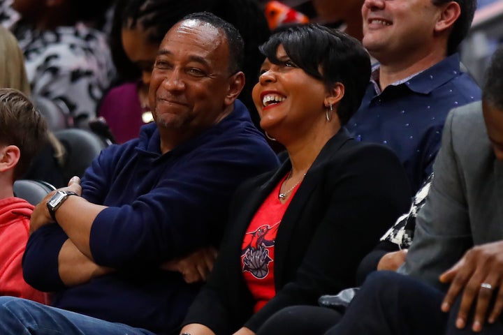 Atlanta Mayor Keisha Lance Bottoms and her husband at an NBA game in February. Bottoms said they both tested positive for cor