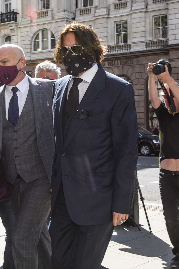 Both Depp and Heard wore face covering as they arrived in court