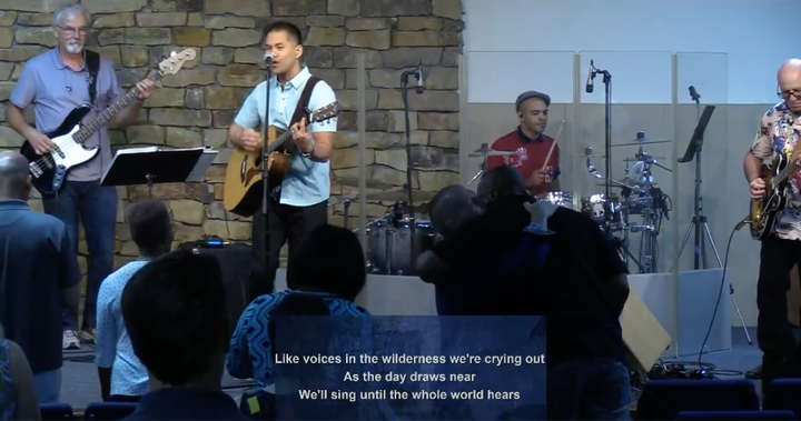 Pastor Ron Arbaugh can be spotted hugging an attendee in this screenshot from a June 21 service at Calvary Chapel of San Antonio.